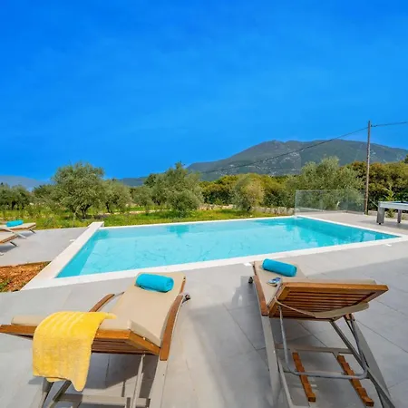 Corelli By * كارافوميلوس